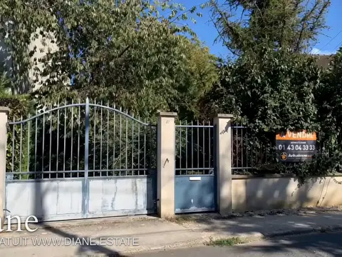 Terrain à vendre avec maisonnette et cabanon de jardin 