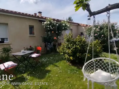 Maison entre ville et campagne