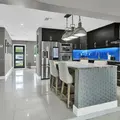 Kitchen with a central island and bar stools
