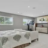 Bedroom with garden-facing windows