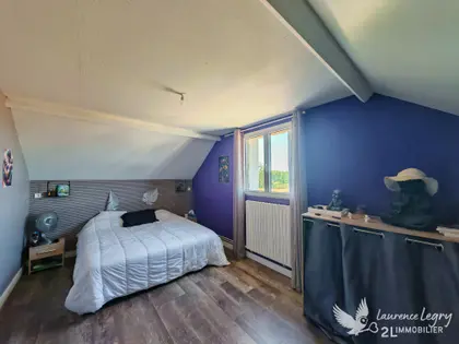 Pavillon à Parigné-l'Évêque (14)