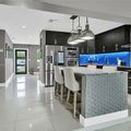 Kitchen with a central island and bar stools