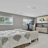Bedroom with garden-facing windows